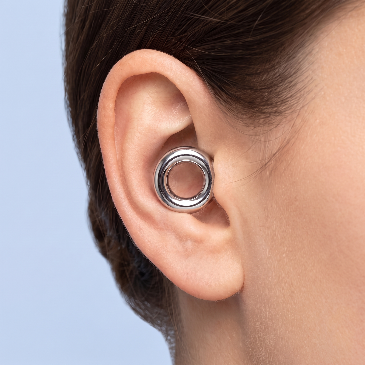 Metal Edition Earplugs in Silver, worn in ear