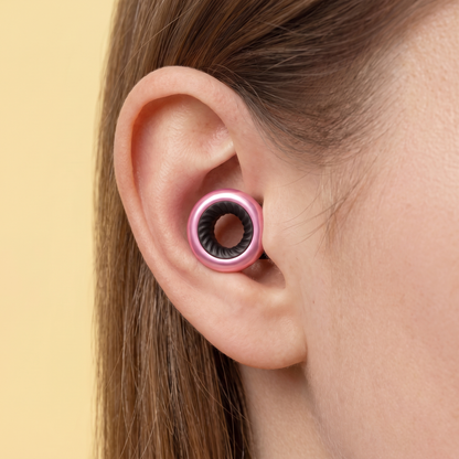 Ring Earplugs in Pink Black, worn in ear