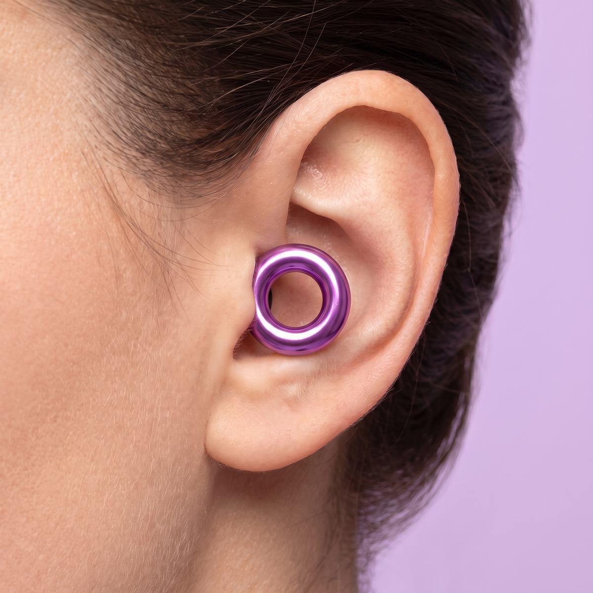 Metal Edition Earplugs in Purple, worn in ear