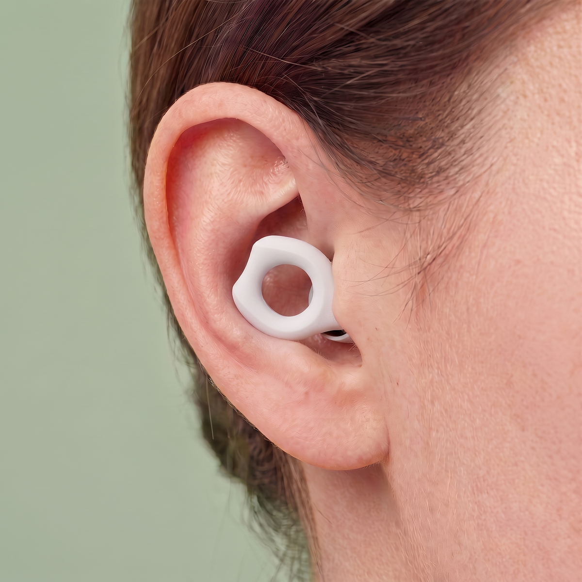 Silicone Earplugs in White, worn in ear