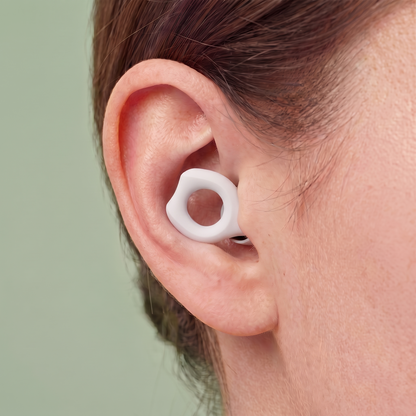 Silicone Earplugs in White, worn in ear