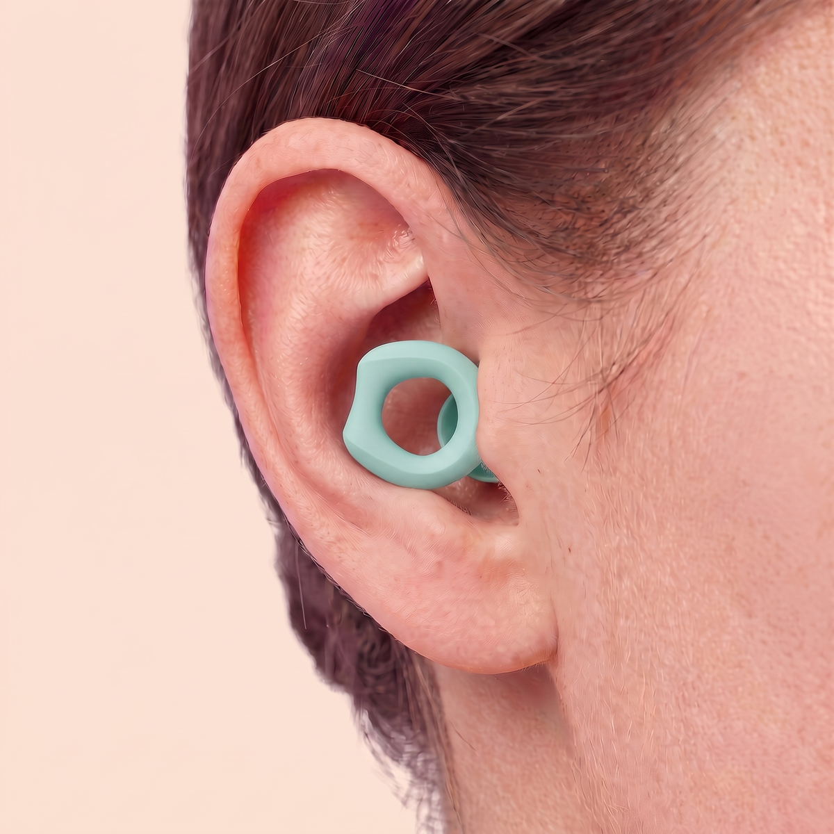 Silicone Earplugs in Blue, worn in ear