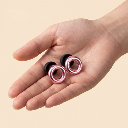 Metal Edition Earplugs in Rose Gold, in hand